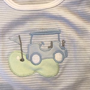 Magnolia Baby romper with adorable golf appliqué.
